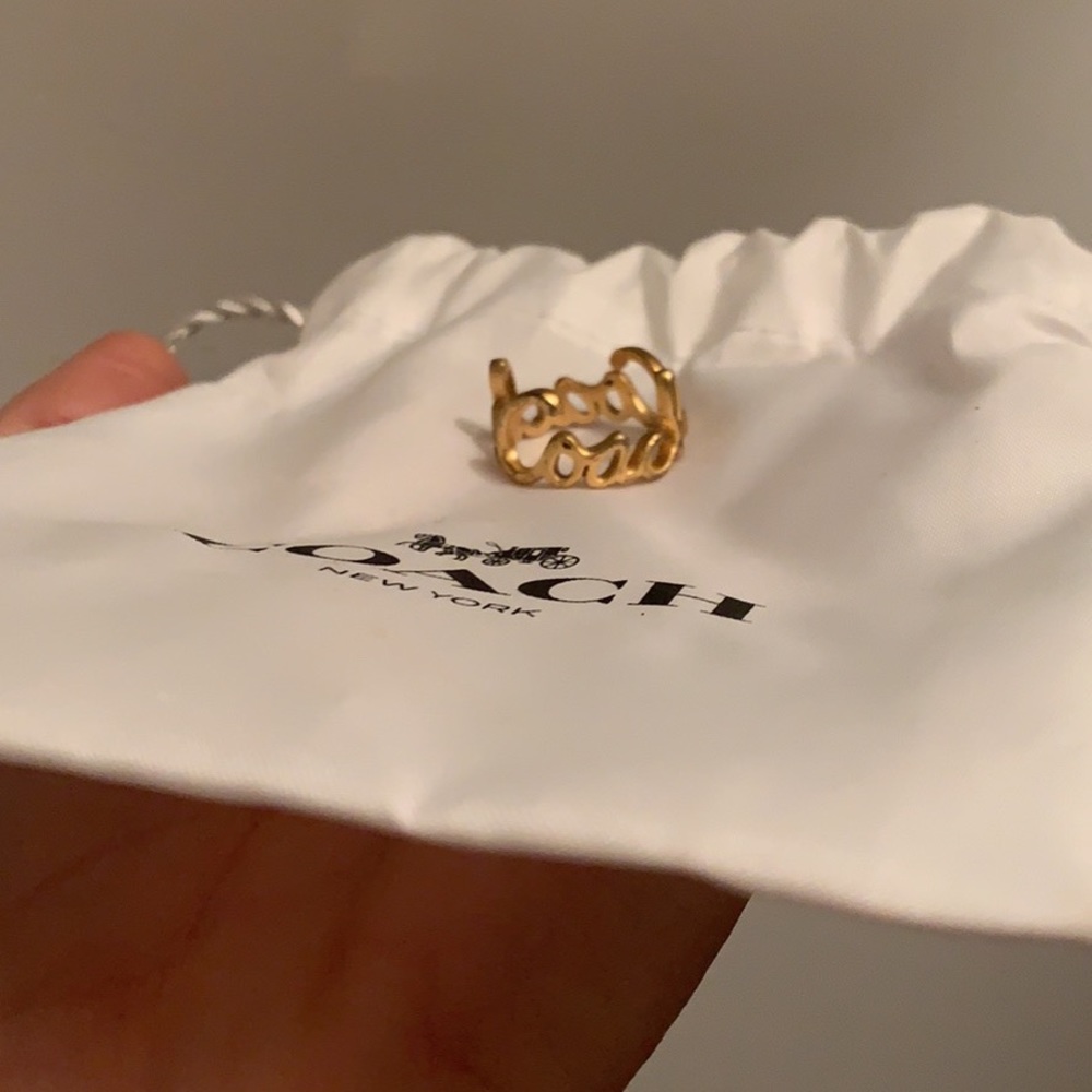 Gold tone coach ring